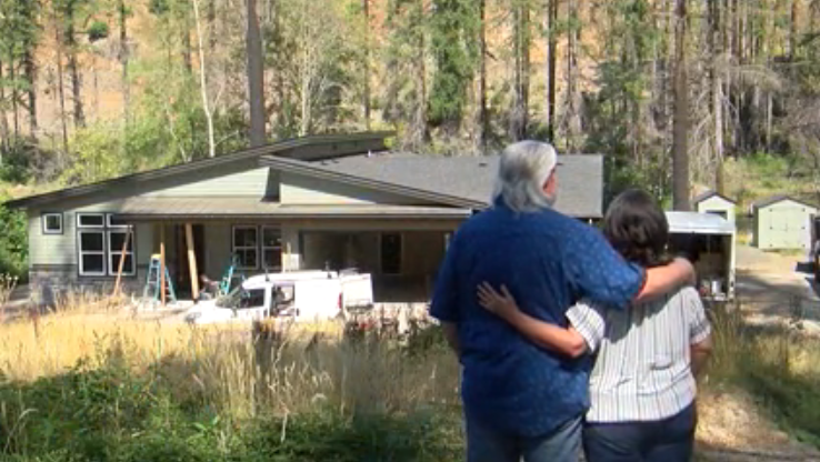 Geoff and Lisa Blumhagen at their rebuilt home